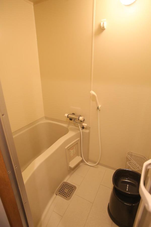 N33 Hakata Sta East Apartment Fukuoka  Bagian luar foto
